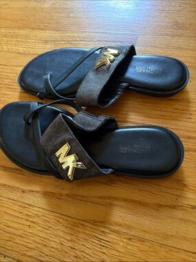 Michael Kors Black Footbed Brown Textured Strap Sandals with Gold MK Charm